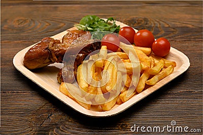 Chicken drums with French fries Stock Photo