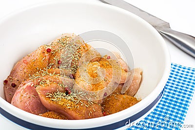 Chicken fillet pieces with spices for cooking Stock Photo