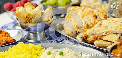Chicken jalfrezi and chicken curry with various rice and onion Bhajis and Samosas Stock Photo
