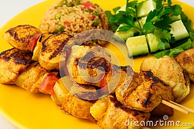 The chicken kebab on skewers with vegetables Stock Photo