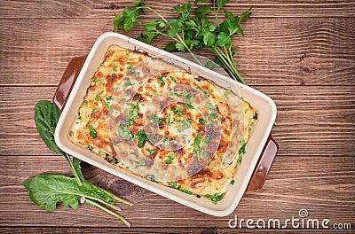 Chicken lasagna and white cheese . Stock Photo