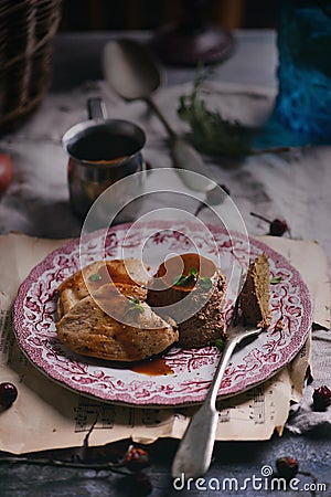 Chicken liver flan with chicken breast and demiglas sauce.selective focus Stock Photo