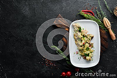 Chicken liver, heart and stomach in cream sauce. Restaurant dishes. Top view. Stock Photo