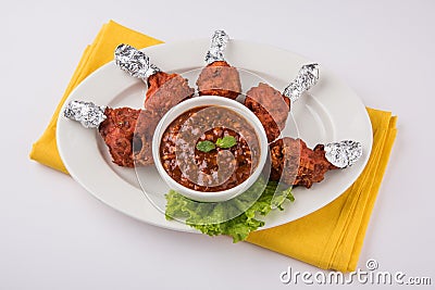 Chicken lollipop or chicken winglet Stock Photo