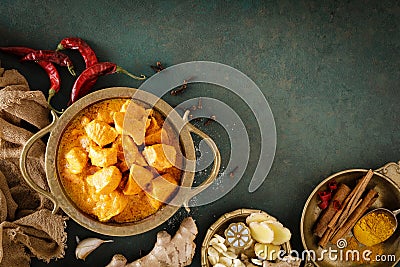 Chicken masala curry, spicy meat. Yellow chicken curry sauce. Spicy chicken curry dish. Traditional indian food, asian cuisine Stock Photo