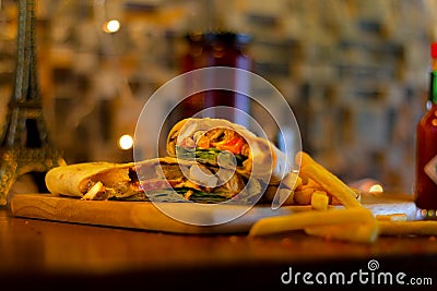 Chicken Maxicano Wrap with french fries Stock Photo