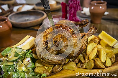 chicken meal in medieval tavern, Hungary Stock Photo