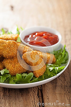 Chicken nuggets with ketchup Stock Photo