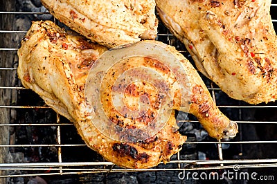 Chicken over a fire Stock Photo