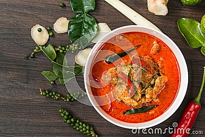 Chicken panang curry and ingredient spice on wooden background i Stock Photo