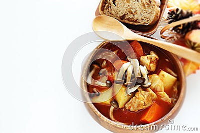Chicken red soup and mushroom curry in white bowl Stock Photo