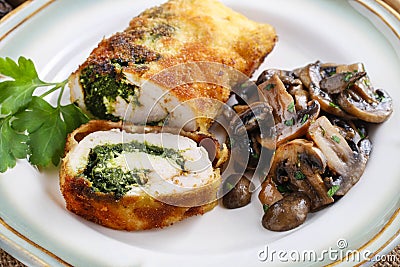 Chicken roll stuffed with spinach and roasted mushroom Stock Photo
