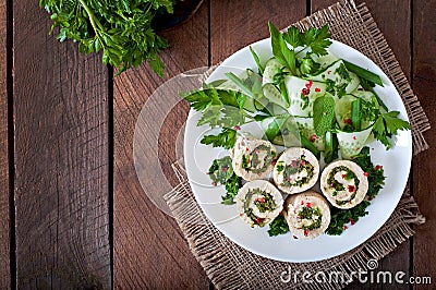 Chicken rolls with greens and fresh vegetable salad Stock Photo