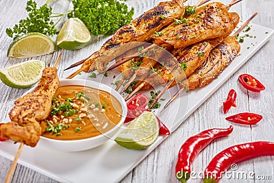 Chicken satay on skewers with sauce Stock Photo