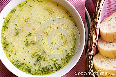 Chicken soup and bread Stock Photo