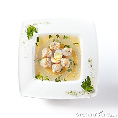 Chicken Soup with Meatballs Decorated with Boiled Quail Egg Stock Photo