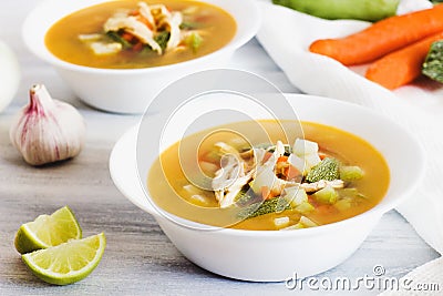 Chicken soup and in white bowl mexican food broth in mexico city Stock Photo