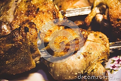 Chicken thighs on skewers close-up. Roasted chicken Stock Photo