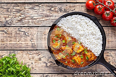 Chicken tikka masala Asian traditional spicy meat food and rice Stock Photo