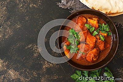 Chicken Tikka masala in the bowl. Asian food. Top view, copy space. Stock Photo