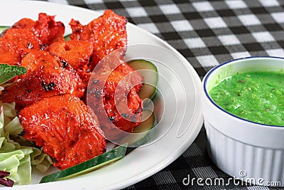 Chicken tikka with salad and sauce Stock Photo