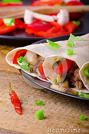 Chicken tortilla with mushrooms, garlic Stock Photo