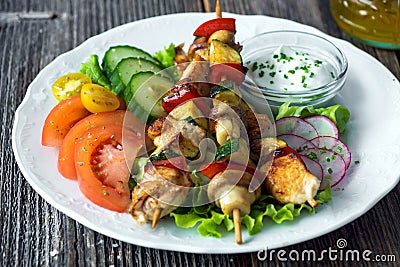 Chicken and vegetable skewers Stock Photo