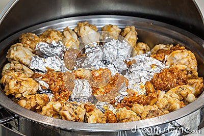 Chicken wing in food warmer Stock Photo