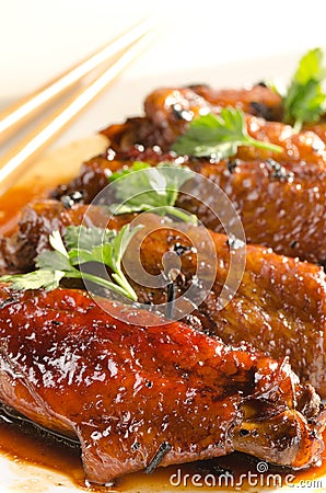 Chicken wings in chinese sauce with puer tea and h Stock Photo