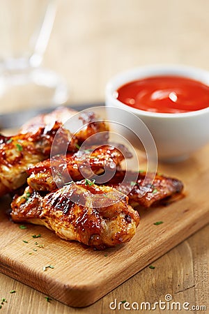 Chicken wings with sriracha sauce Stock Photo