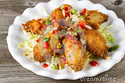 Chicken wings in white plate ready to eat Stock Photo