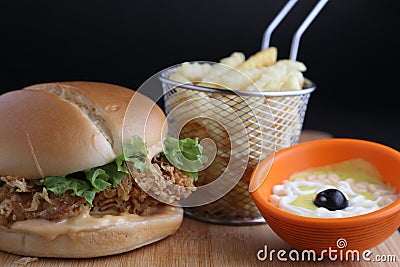 Chicken zinger burger with fries and dip Stock Photo
