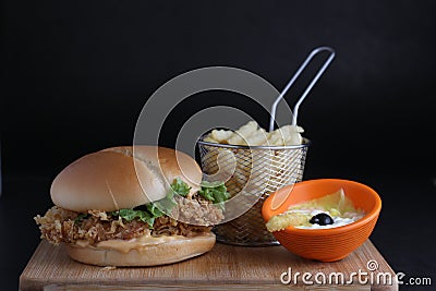 Chicken zinger burger with fries and dip Stock Photo