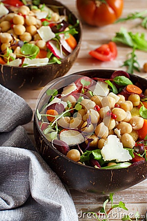 Chickpea salad with vegetables and microgreens Stock Photo
