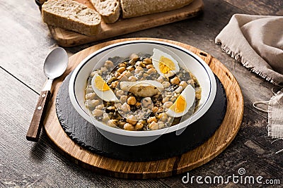 Chickpea stew with spinach and cod or potaje de vigilia. Typical spanish food Stock Photo