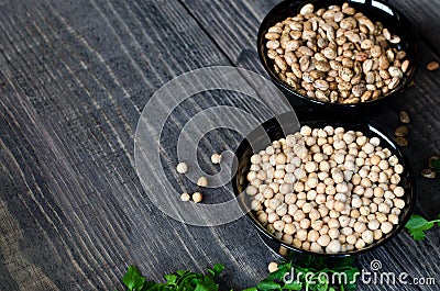 Chickpeas and beans in bowls Stock Photo