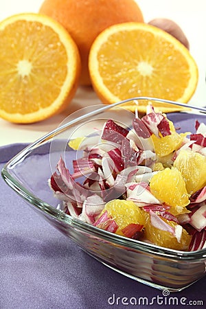 Chicory salad with fresh orange slices Stock Photo