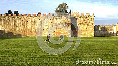 Chidren playing outdoor in Pisa, Italy Editorial Stock Photo