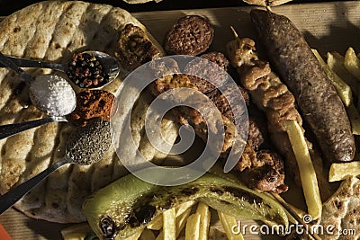 Chiken meat.soutzouki and sausage on a stick Stock Photo