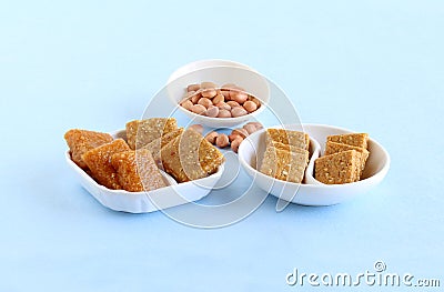 Chikki Indian Sweet Dish and its Main Ingredient Peanuts Stock Photo