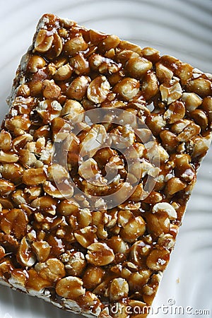 Chikki is a traditional ready-to-eat Indian sweet Stock Photo