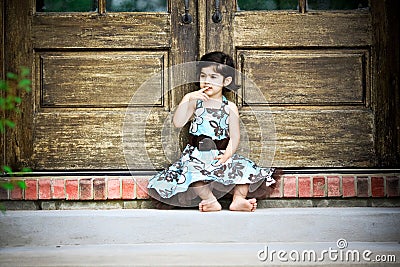 Child and antique door Stock Photo