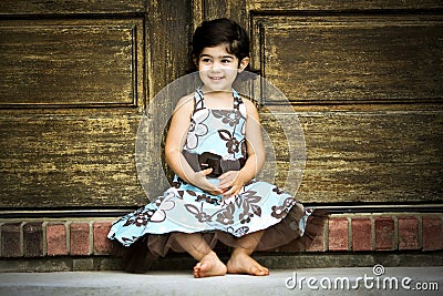 Child and antique door Stock Photo