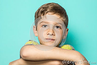 Child with arms folded Stock Photo