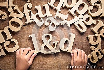 Child Arrange Alphabets as L&D Learning and Development Stock Photo