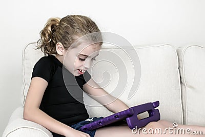 Child With Autism Wearing Compression Garment Stock Photo