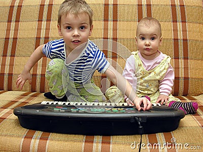 Child and baby play Stock Photo