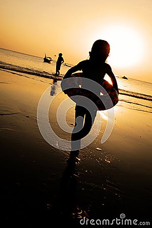 Child Beach Sunset Holiday Girl Playing Concept Stock Photo