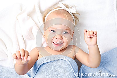 Child,baby girl in bed top view.Skin care nursery concept. Stock Photo