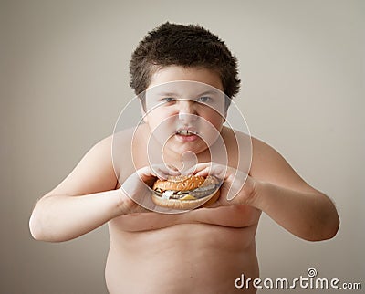 Child boy kid fat burger diet eating cheeseburger Stock Photo